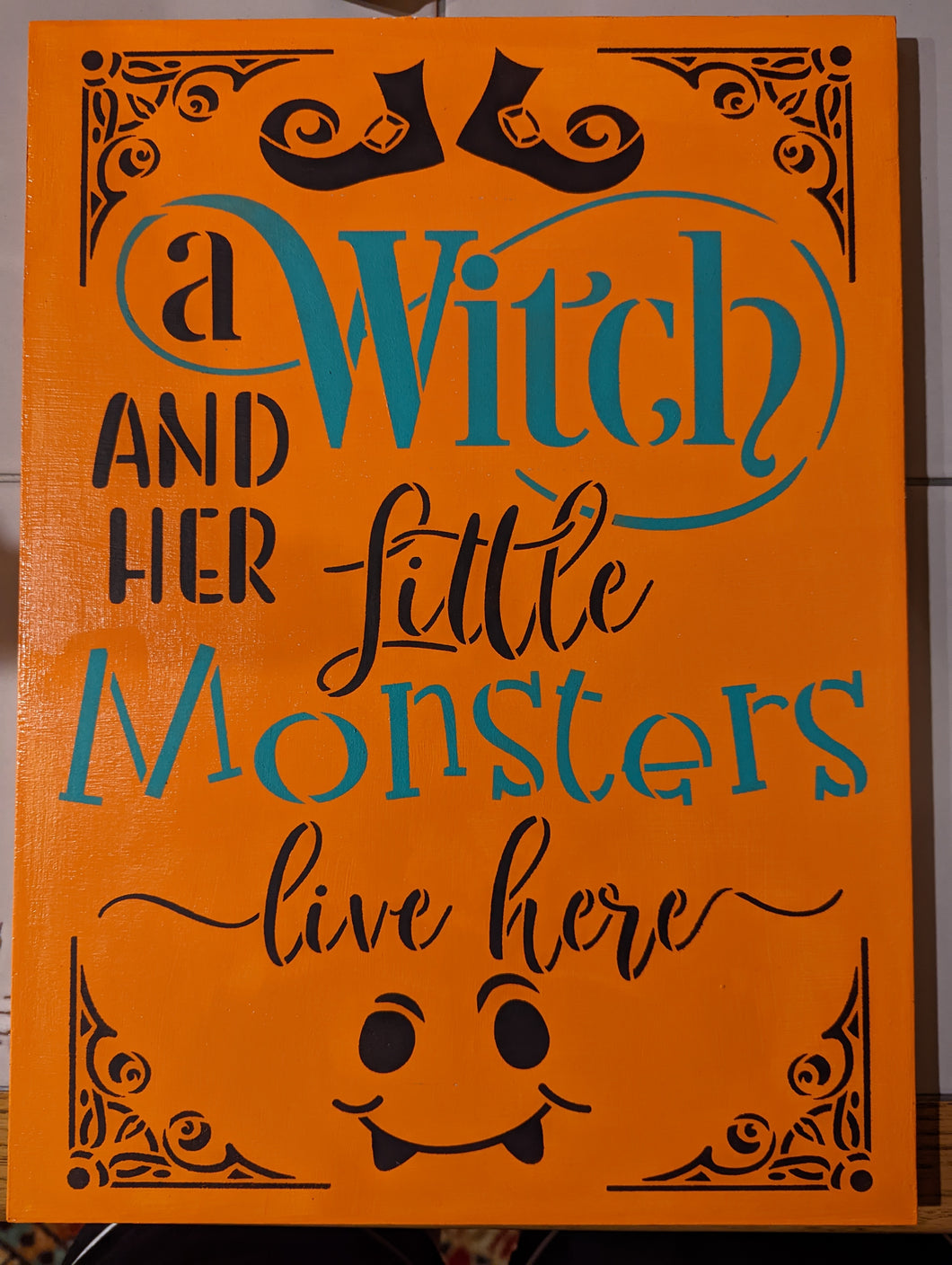 A Witch & Her Little Monsters Live Here
