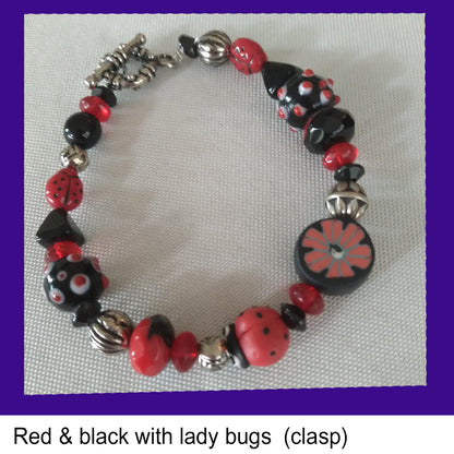 Red and black with lady bugs (clasp)