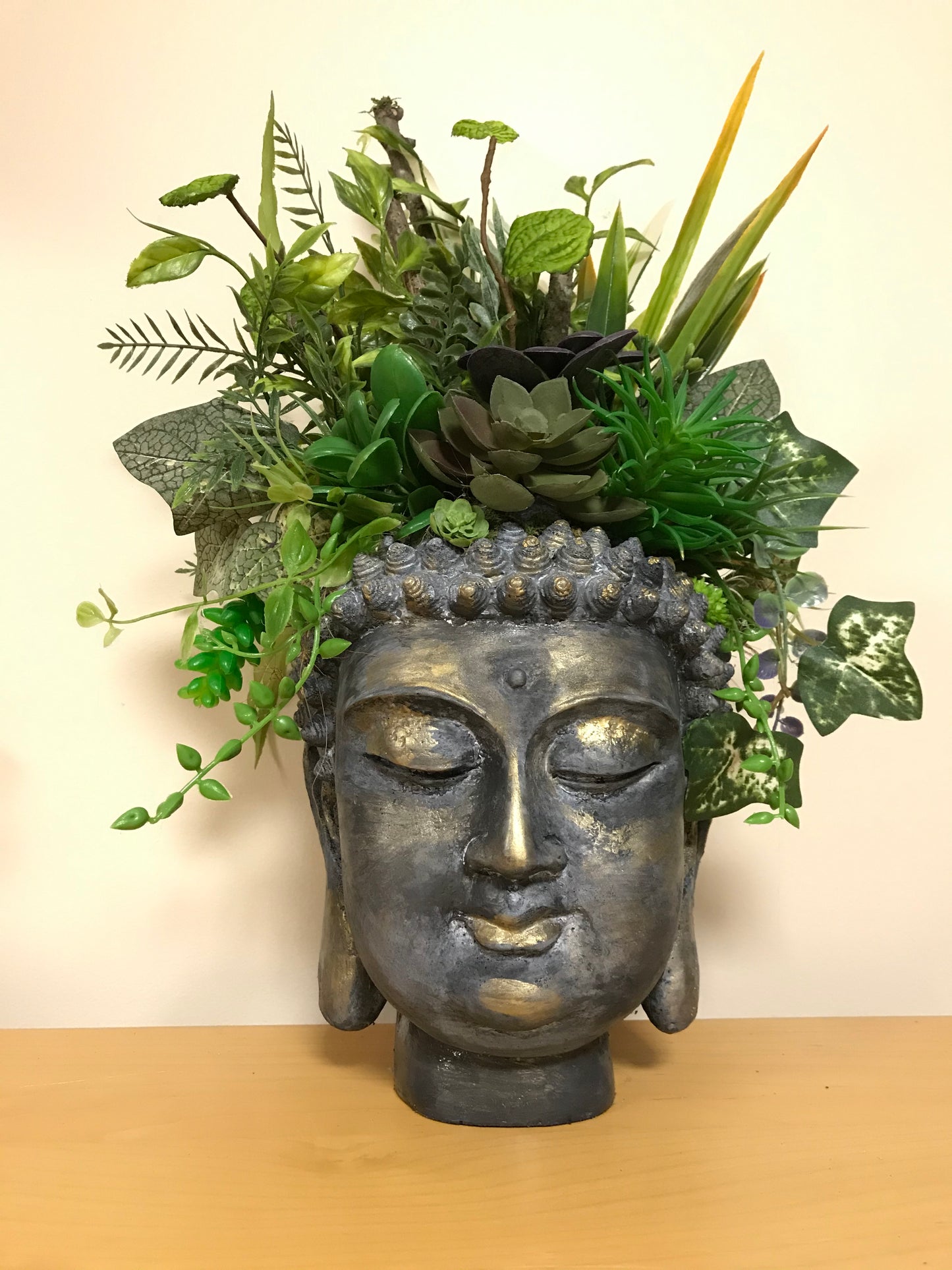 Ebony Buddha Planter with Metallic Highlights on Wood Base